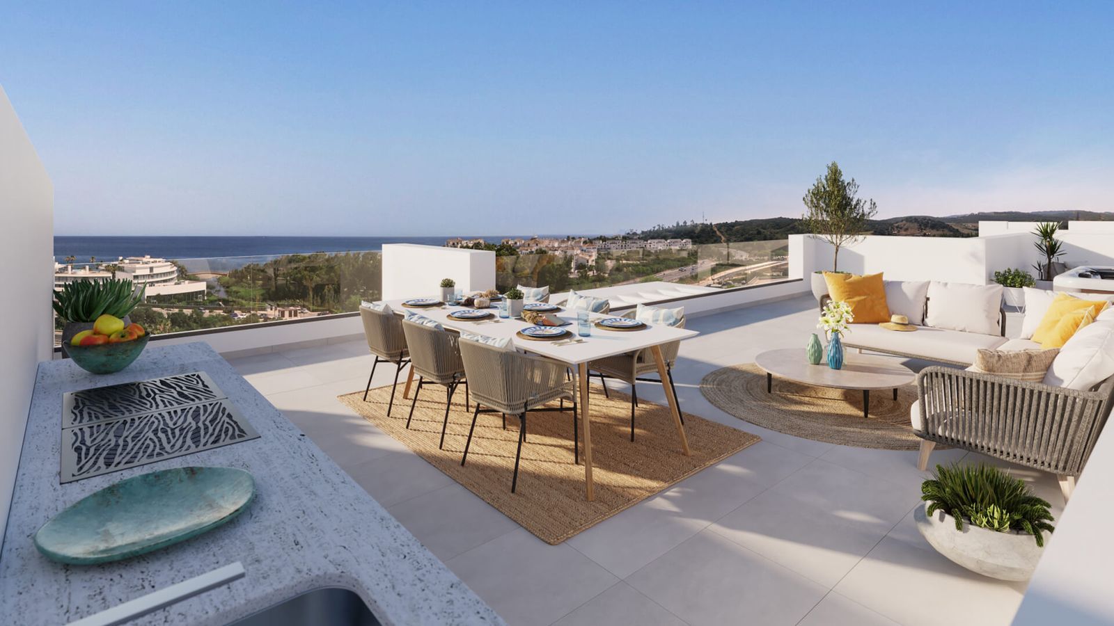 Terras met zeezicht in Mala Kai, Estepona, met eettafel en loungeset.
